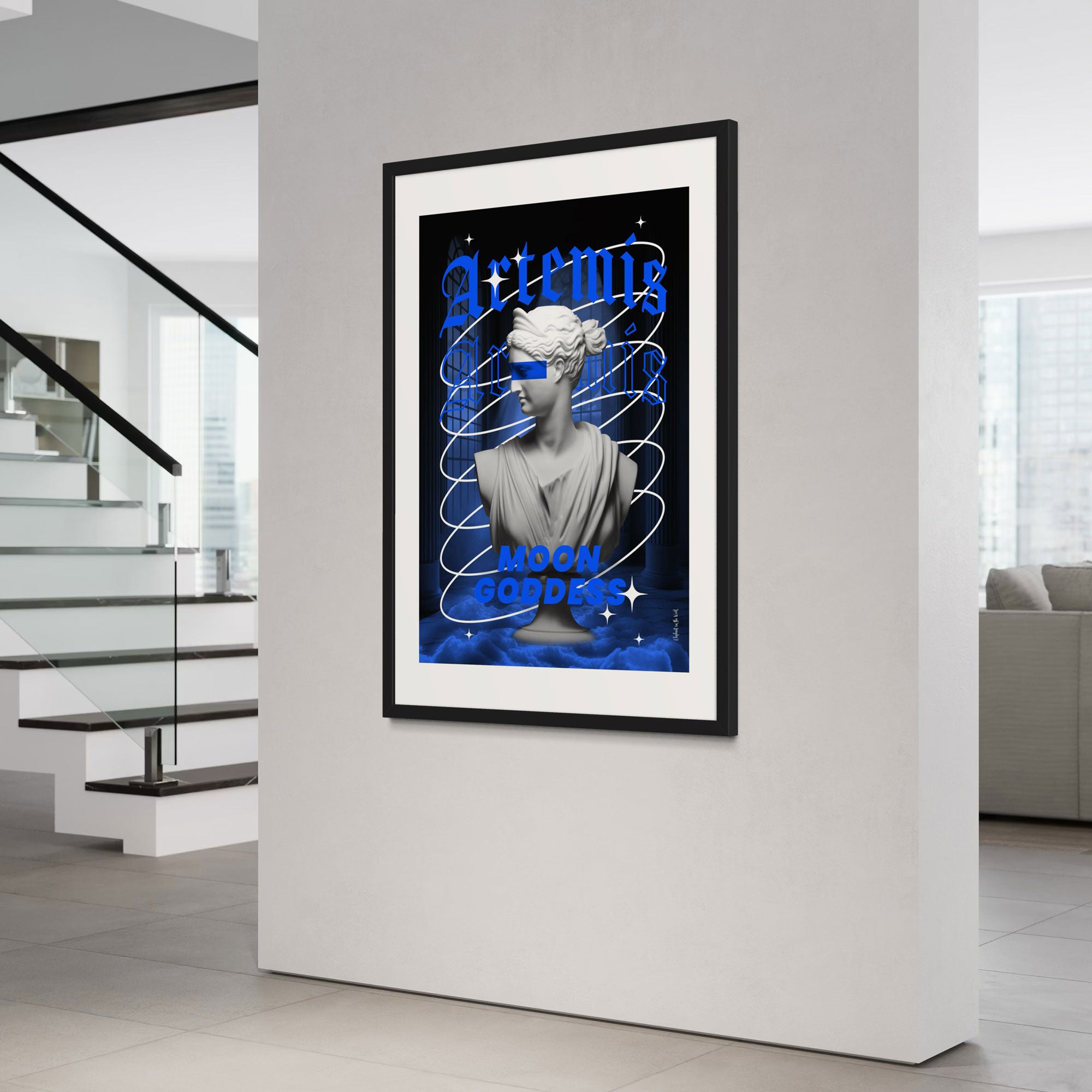 Artemis Wall Art Print featuring a bust of the moon goddess in mesmerizing blue hues, framed in a modern living space.